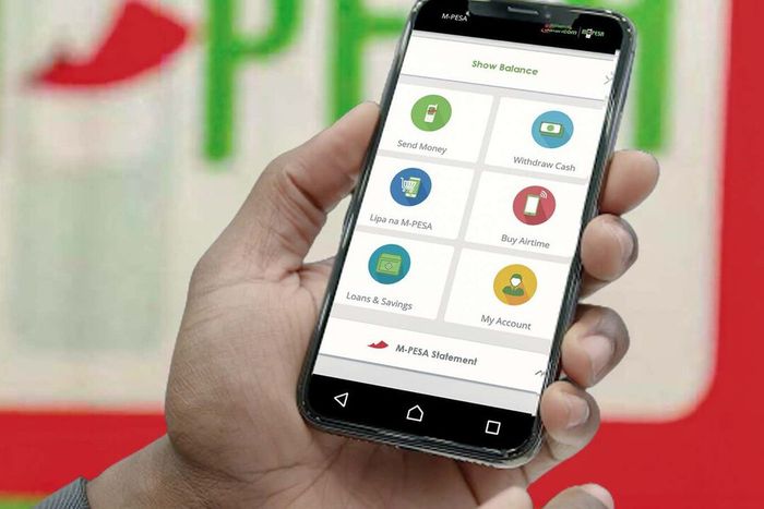 A person scrolling through the MPESA menu