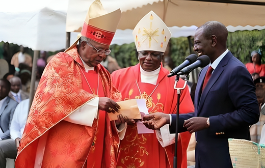 William Ruto receives a donation from John Cardinal Njue (left) during a fundraiser at St Thomas Moore Kairuri Catholic Parish on July 1, 2018