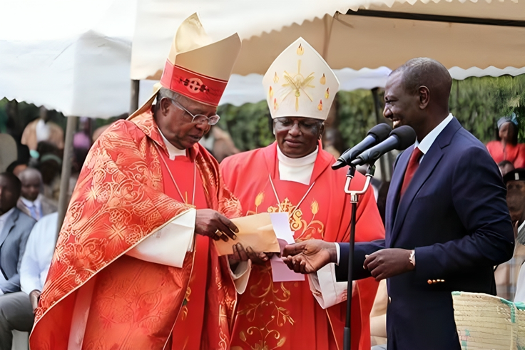 William Ruto receives a donation from John Cardinal Njue (left) during a fundraiser at St Thomas Moore Kairuri Catholic Parish on July 1, 2018
