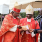 William Ruto receives a donation from John Cardinal Njue (left) during a fundraiser at St Thomas Moore Kairuri Catholic Parish on July 1, 2018