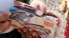 A person holding money