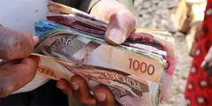 A person holding money