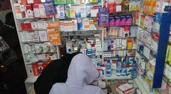 A chemist with drugs