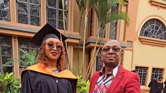 Maurine Kabu with her father Simon Kabu on her graduation