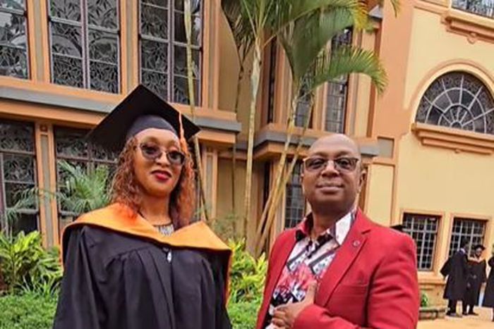 Maurine Kabu with her father Simon Kabu on her graduation