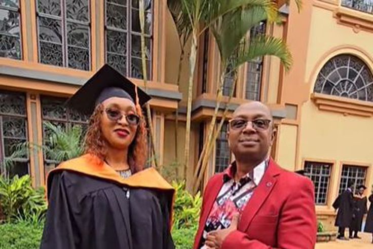 Maurine Kabu with her father Simon Kabu on her graduation