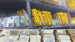 A photo of uncollected number plates and log books
