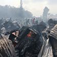The aftermath of a fire that razed down Toi Market on Saturday