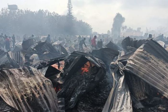 The aftermath of a fire that razed down Toi Market on Saturday