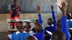 A teacher teaching in class
