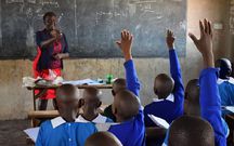 A teacher teaching in class