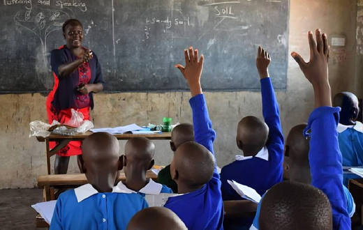 A teacher teaching in class