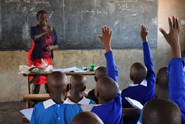 A teacher teaching in class