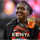 Faith Kipyegon shows off her Gold Medal during a past competition