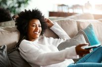 A person watching TV