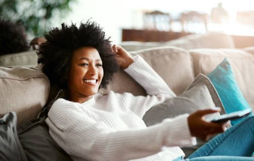 A person watching TV