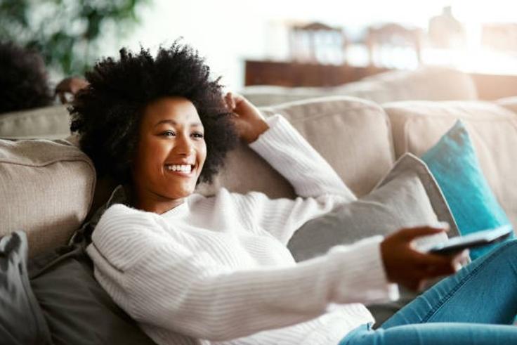 A person watching TV