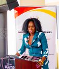 Akothee speaking during the Uganda-Kenya Coast Tourism Conference in Uganda on August 2024.