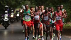 EUGENE, OREGON - JULY 17: Tamirat Tola of Team Ethiopia, Barnabas Kiptum of Team Kenya, Geoffrey Kamworor of Team Kenya and Shumi Dechasa of Team Bahrain compete in the Men's Marathon on day three of the World Athletics Championships Oregon22 at Hayward Field on July 17, 2022 in Eugene, Oregon. (Photo by Patrick Smith/Getty Images)