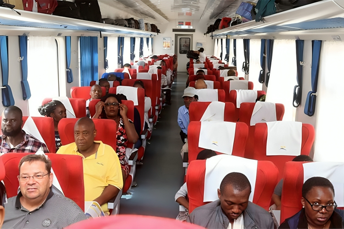 Passengers in the Standard Gauge Railway