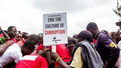 File image of protesters at a past demo against corruption