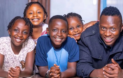 Oga Obinna with his 4 children