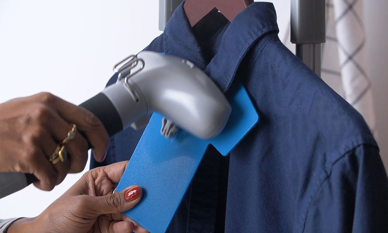 A shirt being ironed