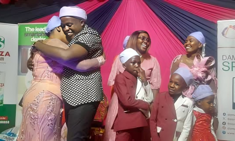 Karangu Muraya hugging his wife Trizah