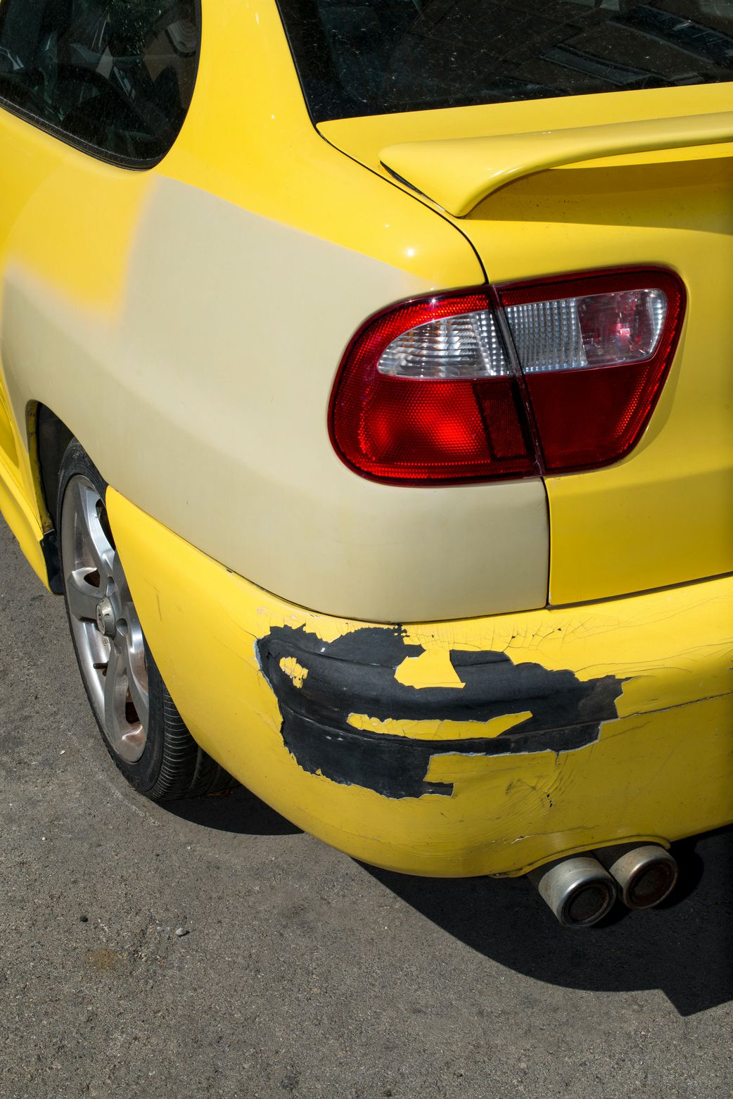 A vehicle with rear bumper damage