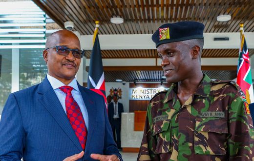Chief of the Defence Forces (CDF) General Charles Kahariri with Corporal Boniface Muchiri