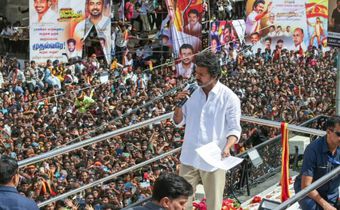 Tamil actor Vijay addressing a rally. 39 people died in a stampede at a rally he was addressing on Saturday