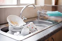 Dirty dishes in a sink