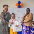 Racheal Nafula from Little Rock School poses for a photo with her mother and the Deputy Director - Cataloguing, classification, and Distribution, KNLS Betty Kalugho during the World Readers Awards at Kenya National Library.