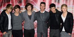 Simon Cowell with One Direction, his most successful boy band.Getty Images