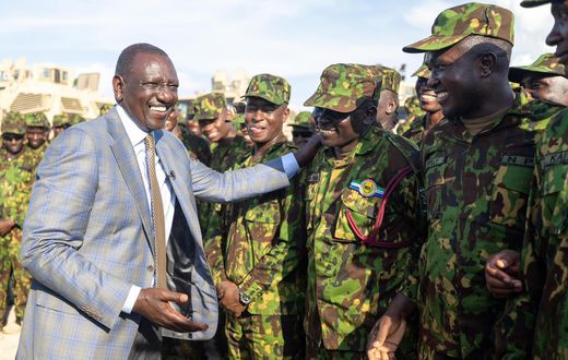 President William Ruto with police officer who are part of the Multinational Security Support Mission for Haiti on September 2024