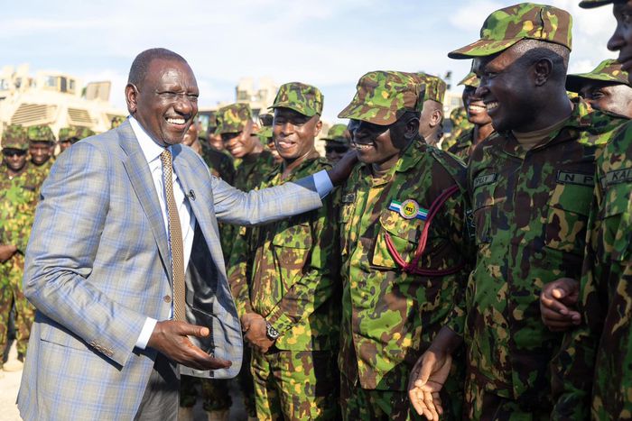 President William Ruto with police officer who are part of the Multinational Security Support Mission for Haiti on September 2024