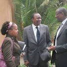 TBT photo of Anne Waiguru while working at the Ministry of Finance with Uhuru Kenyatta as the Minister. On the left is late Juja MP George Thuo