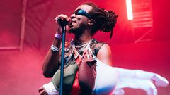 Charisma 'Luhya Heat' performing at the Blankets & Wine stage on October 6, 2024 donning a sling fashioned out of bras that fans throw on stage