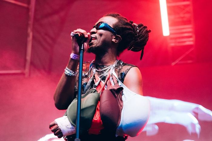 Charisma 'Luhya Heat' performing at the Blankets & Wine stage on October 6, 2024 donning a sling fashioned out of bras that fans throw on stage