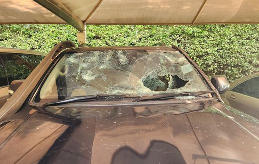 A vehicle in Rigathi Gachagua's convoy damaged during an attack at a funeral in Limuru