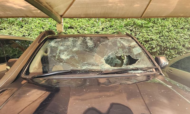 A vehicle in Rigathi Gachagua's convoy damaged during an attack at a funeral in Limuru