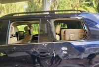 A vehicle in Rigathi Gachagua's convoy damaged  during an attack at a funeral in Limuru