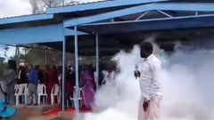 Screengrab image of the chaos that ensued after teargas cannister was lobbed at the dias where former DP Rigathi Gachagua was sitting during the thanksgiving service for Shamata Ward MCA Gitau Njamba in Nyandarua County