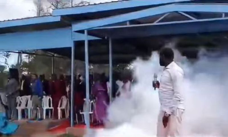 Screengrab image of the chaos that ensued after teargas cannister was lobbed at the dias where former DP Rigathi Gachagua was sitting during the thanksgiving service for Shamata Ward MCA Gitau Njamba in Nyandarua County