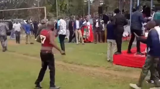 Screengrab image of the chaos that ensued after teargas cannister was lobbed at the dias where former DP Rigathi Gachagua was sitting during the thanksgiving service for Shamata Ward MCA Gitau Njamba in Nyandarua County
