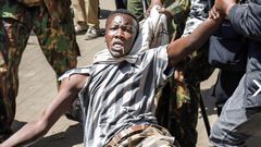 Allans Ademba being apprehended by police during the June 25 anti-finance bill protests