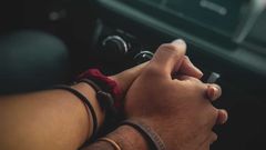 A couple holding hands