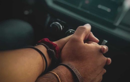 A couple holding hands