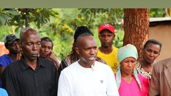 Gukena FM's MC Kajim when he visited the family of David Gitau in Gatundu