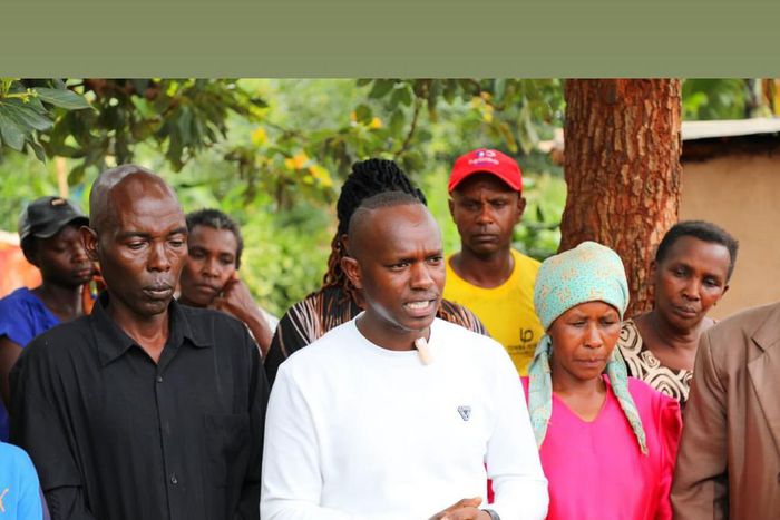 Gukena FM's MC Kajim when he visited the family of David Gitau in Gatundu